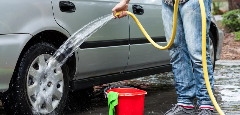 Image of grey car being washed